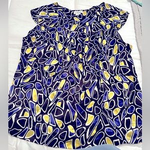 Black, blue, and yellow silky Chaus shell.  Size 16